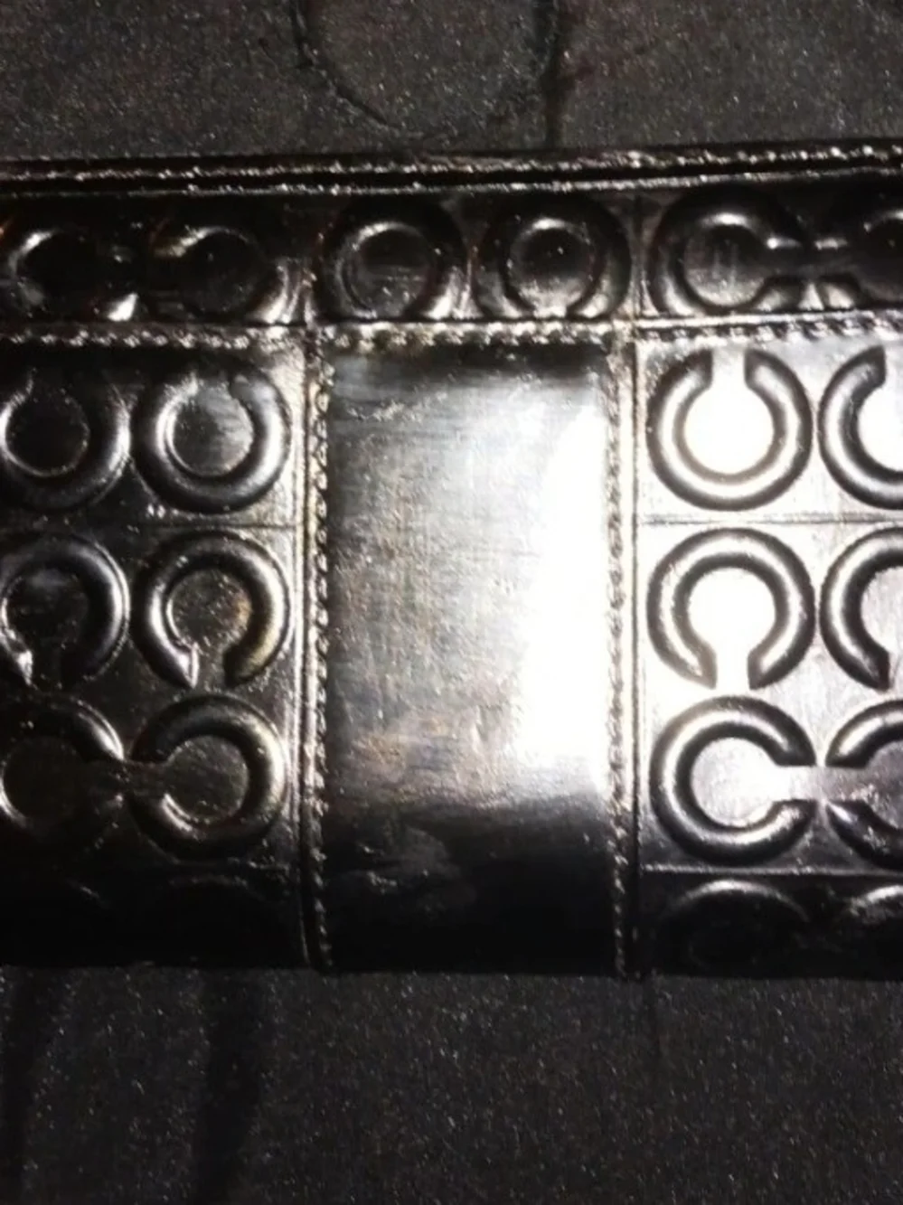 Coach sleek black
